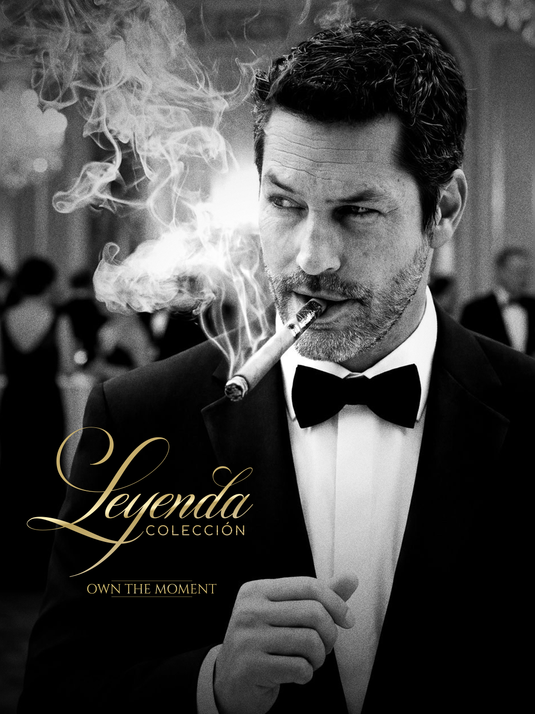 Nacho Valenti Lacroix in black tie, smoking a cigar, for the Dominium Leyenda collection