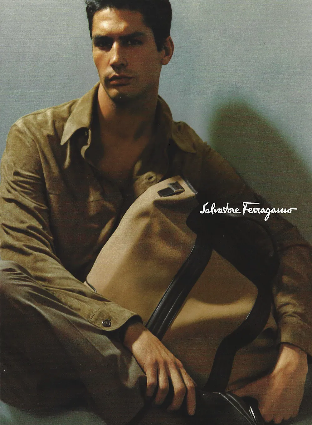 Nacho Valenti Lacroix in a suede overshirt with a canvas bag, Salvatore Ferragamo campaign