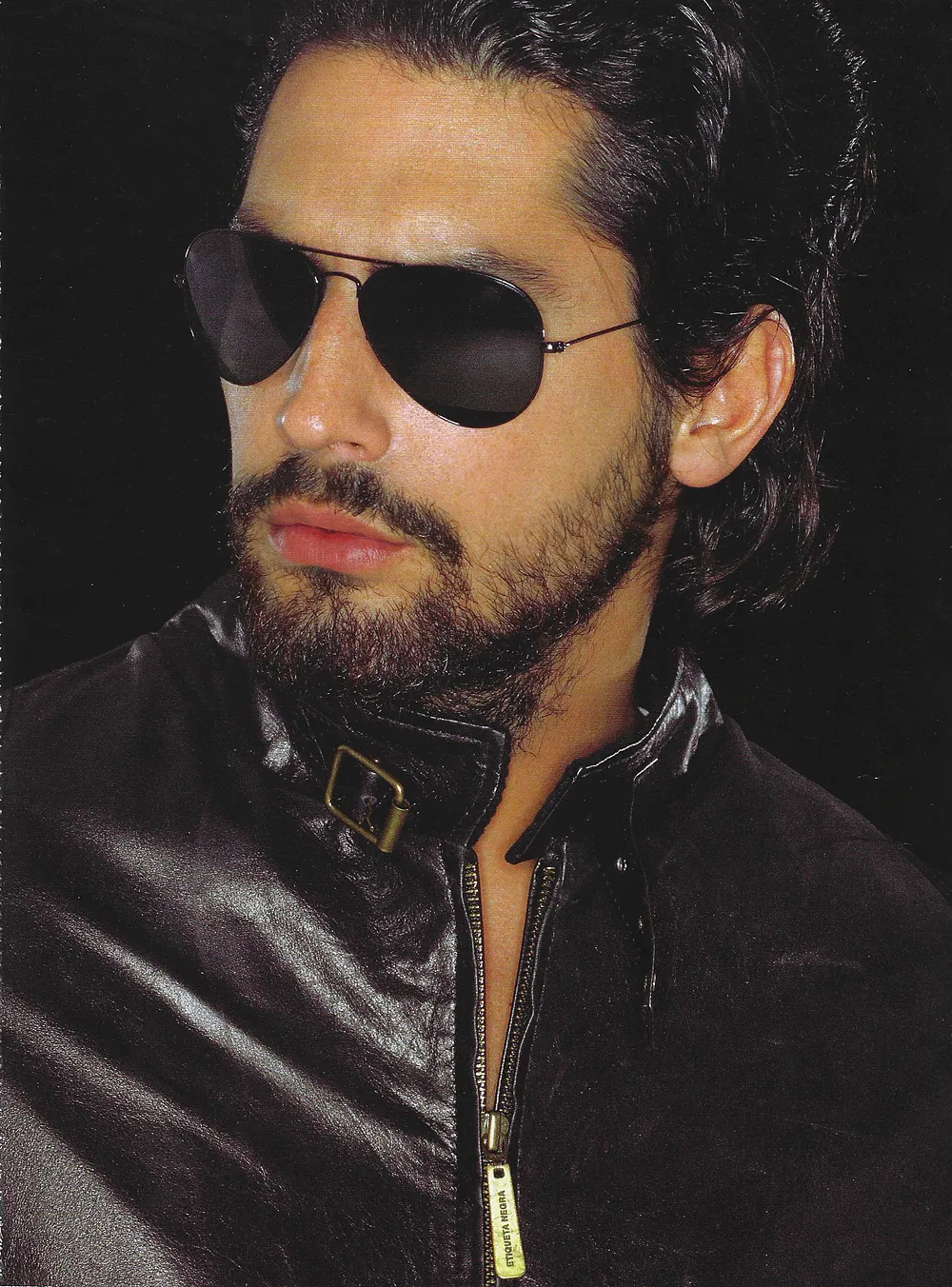 Nacho Valenti Lacroix in aviator sunglasses and an Etiqueta Negra leather jacket